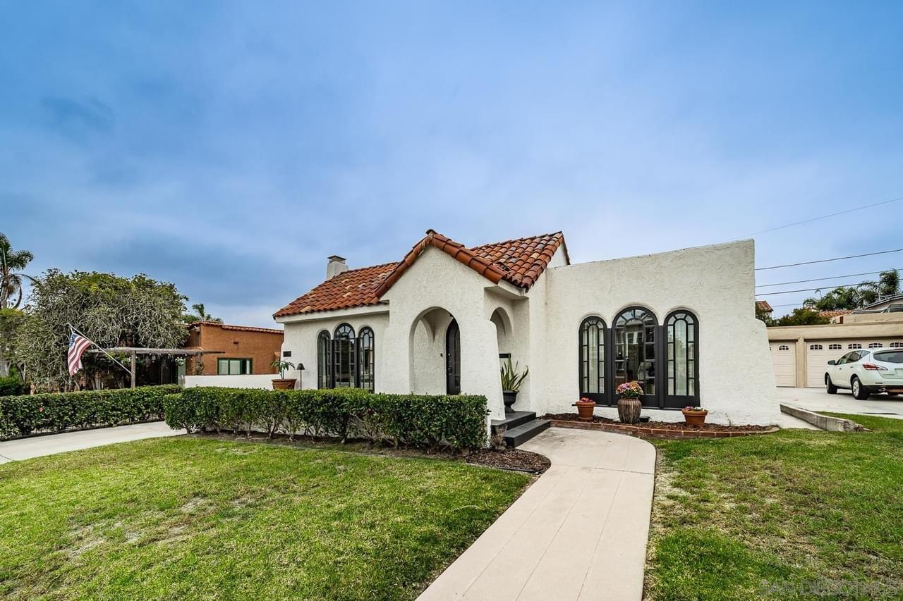 Your dream Spanish style home awaits you. This stunning home boasts large arched windows, oak hardwood floor and a sexy curved ceiling. The homes gets plenty of natural light and has the perfect floor plan for entertaining. 